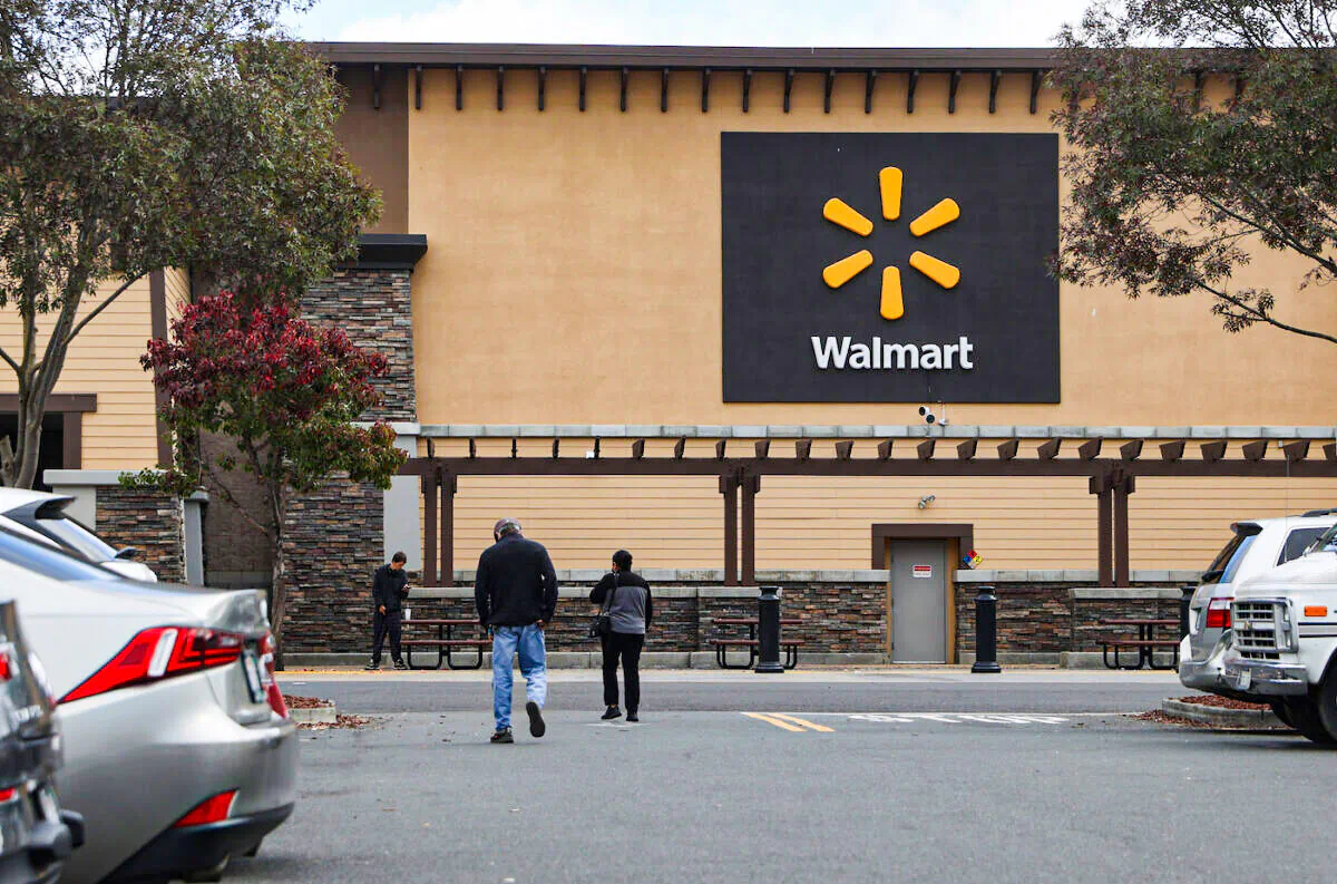Customers enter a Walmart store in American Canyon, California on Nov. 16, 2021. (Justin Sullivan/Getty Images)