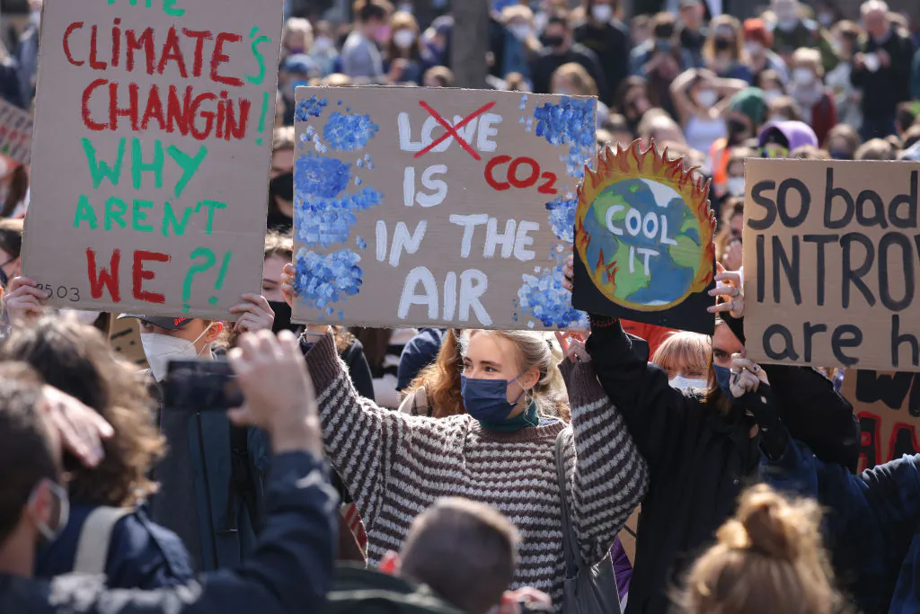 Supporters of the Fridays for Future climate action movement gather as part of a global climate strike in Berlin on March 25, 2022. (Sean Gallup/Getty Images)