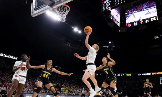 Louisville Advances to 4th Final Four With 62–50 Win Over Michigan