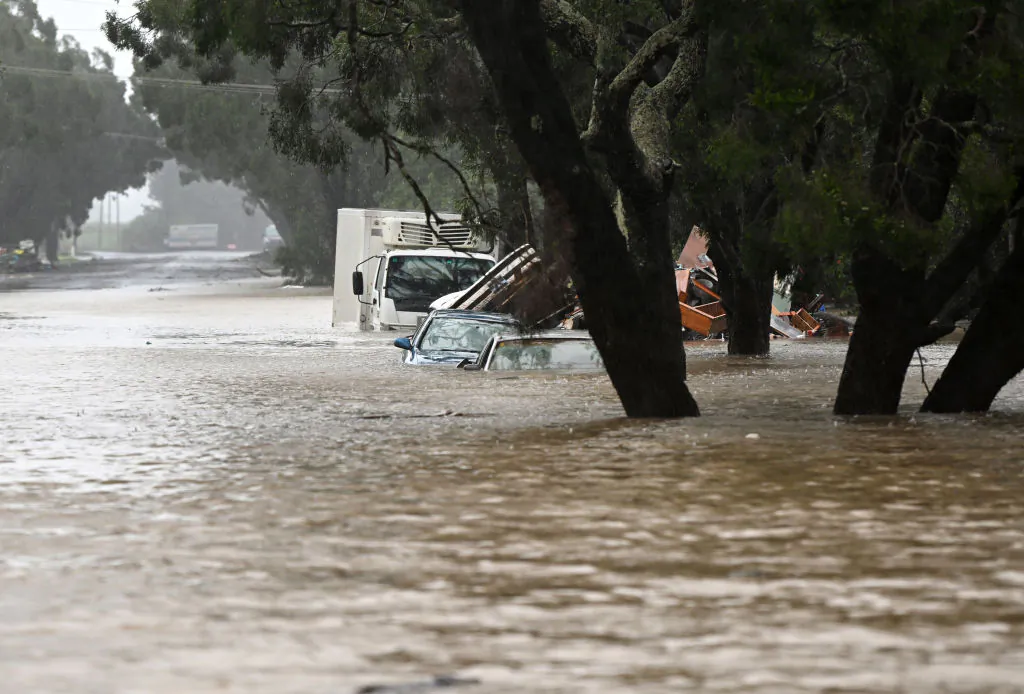 Floodwater inundates cars in Lismore, Australia, on March 30, 2022. (Dan Peled/Getty Images)