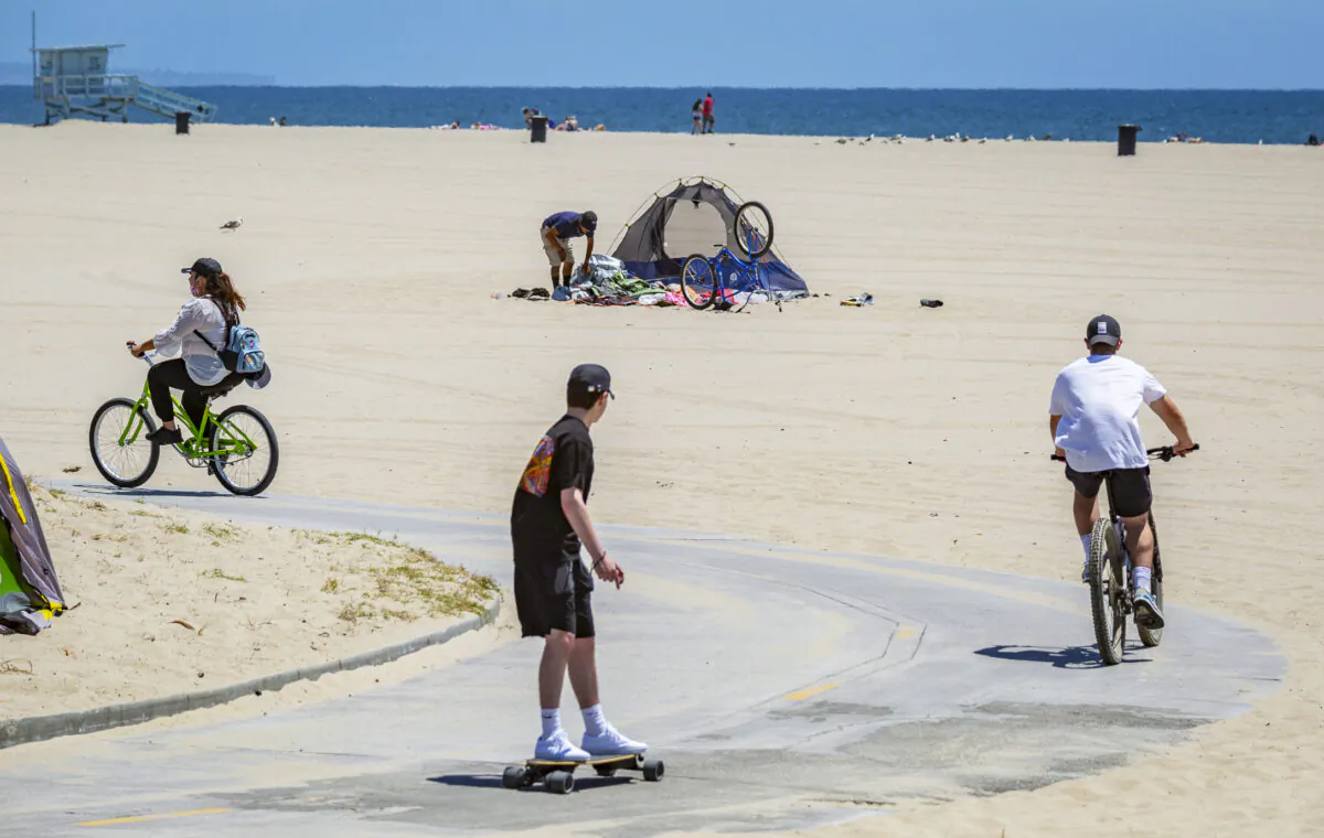 A homeless encampment in near the popular boardwalk area of Venice Beach, Calif., on June 9, 2021. (John Fredricks/The Epoch Times)