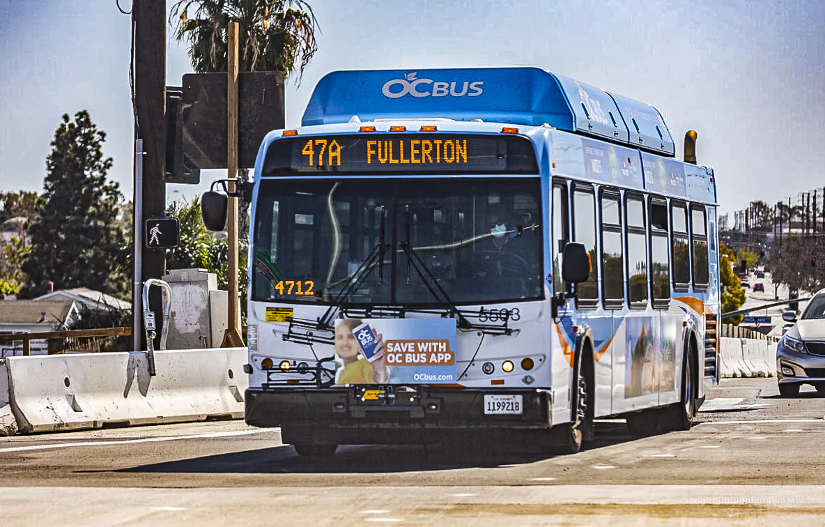 An Orange County Transportation Authority bus transports passengers in Fullerton, Calif., on March 1, 2021. (John Fredricks/The Epoch Times)