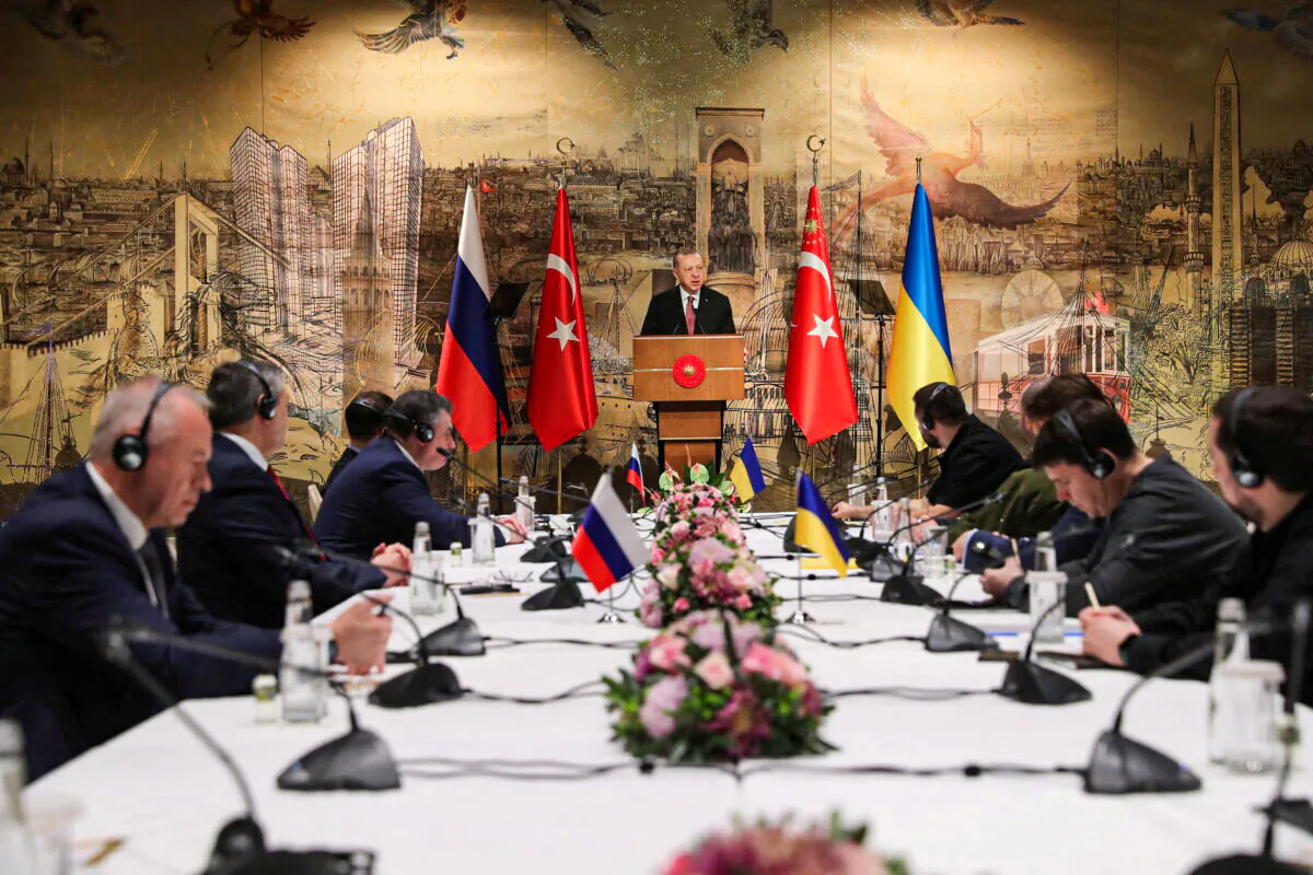 Turkish President Recep Tayyip Erdogan addresses Russian and Ukrainian negotiators before their face-to-face talks in Istanbul, on March 29, 2022. (Murat Cetinmuhurdar/Presidential Press Office/Handout via Reuters)