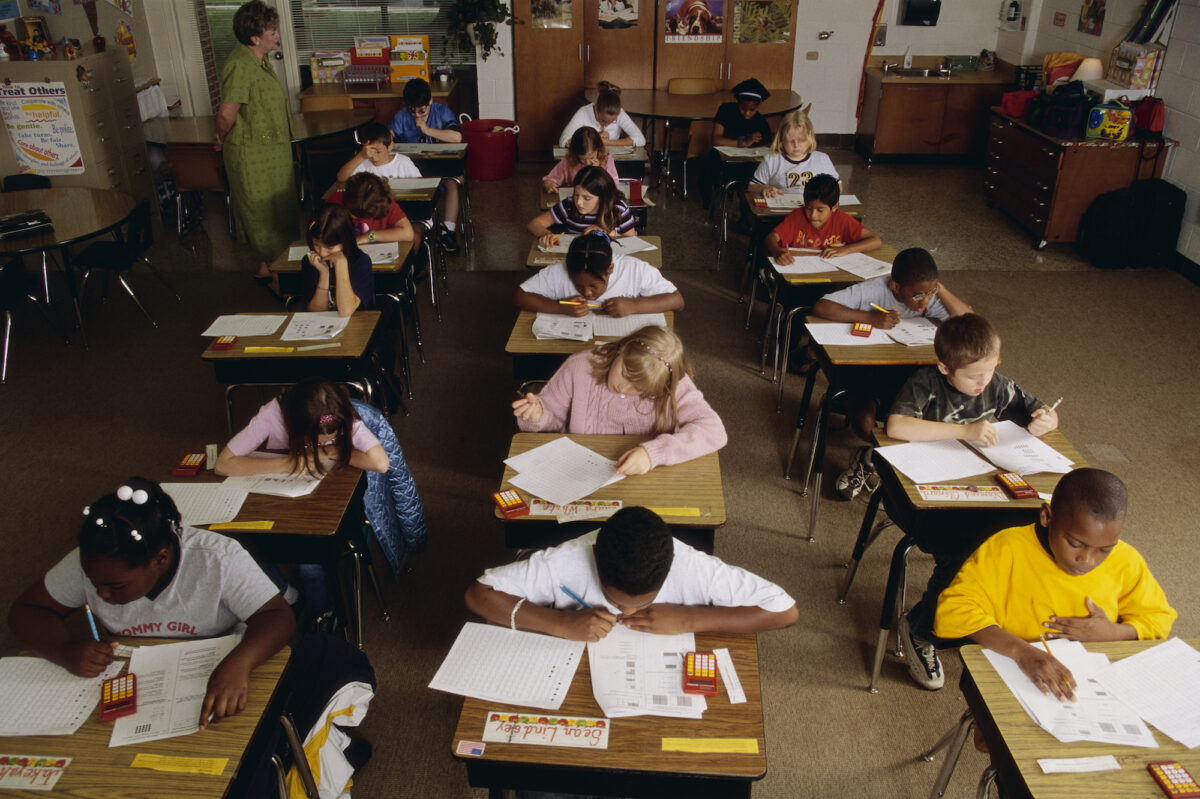 Some experts argue for giving children national standardized tests sooner, even as early as kindergarten. (Will & Deni McIntyre//Getty Images)