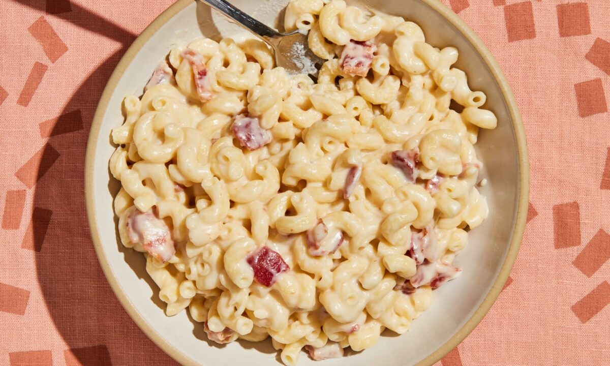 Smoky bacon punches the flavor up in this mac and cheese that doesn't skimp on the cheese sauce. (Christopher Testani/TNS)