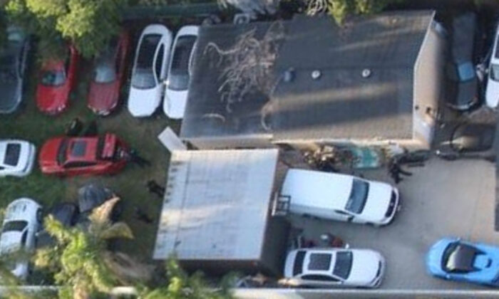 The stolen luxury cars stashed in a backyard in Los Angeles' San Fernando Valley on March 24, 2022. (California Highway Patrol/TNS)