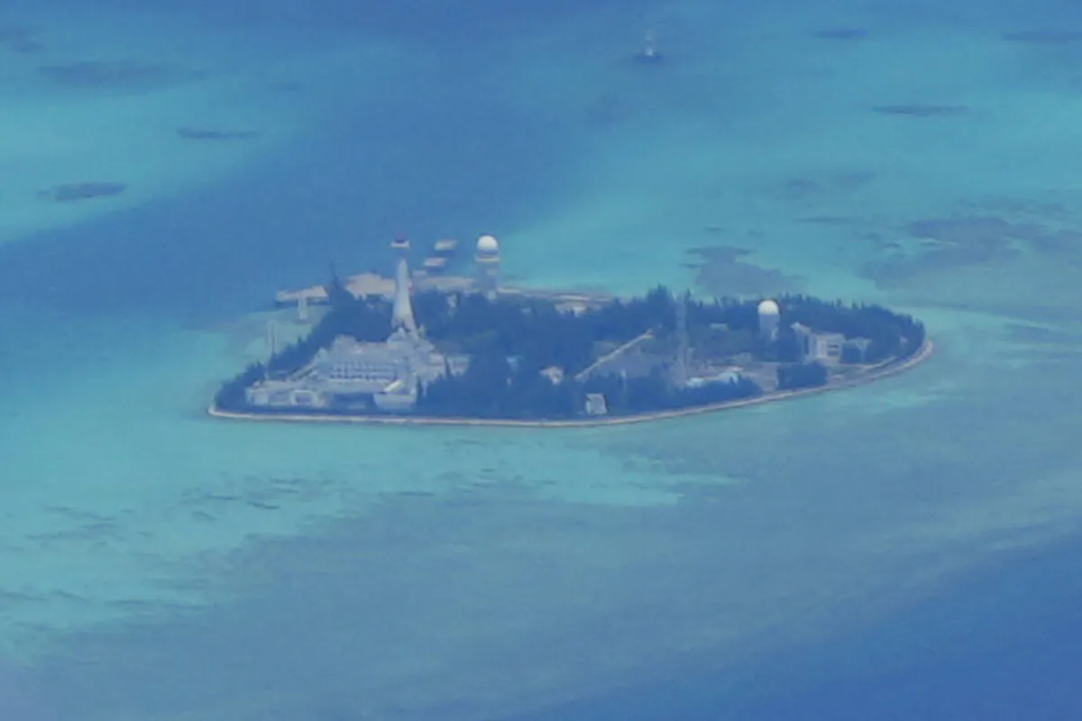 Chinese structures and buildings at the man-made island on Johnson reef at the Spratlys group of islands in the South China Sea on March 20, 2022. (AP Photo/Aaron Favila)
