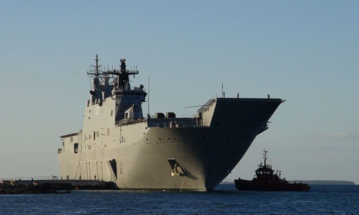 This photo shows the Australian Navy's HMAS Adelaide docked at Vuna Wharf in Nukualofa, Tonga, on Jan. 26, 2022. (Mary Lyn Fonua/Matangi Tonga/AFP via Getty Images)