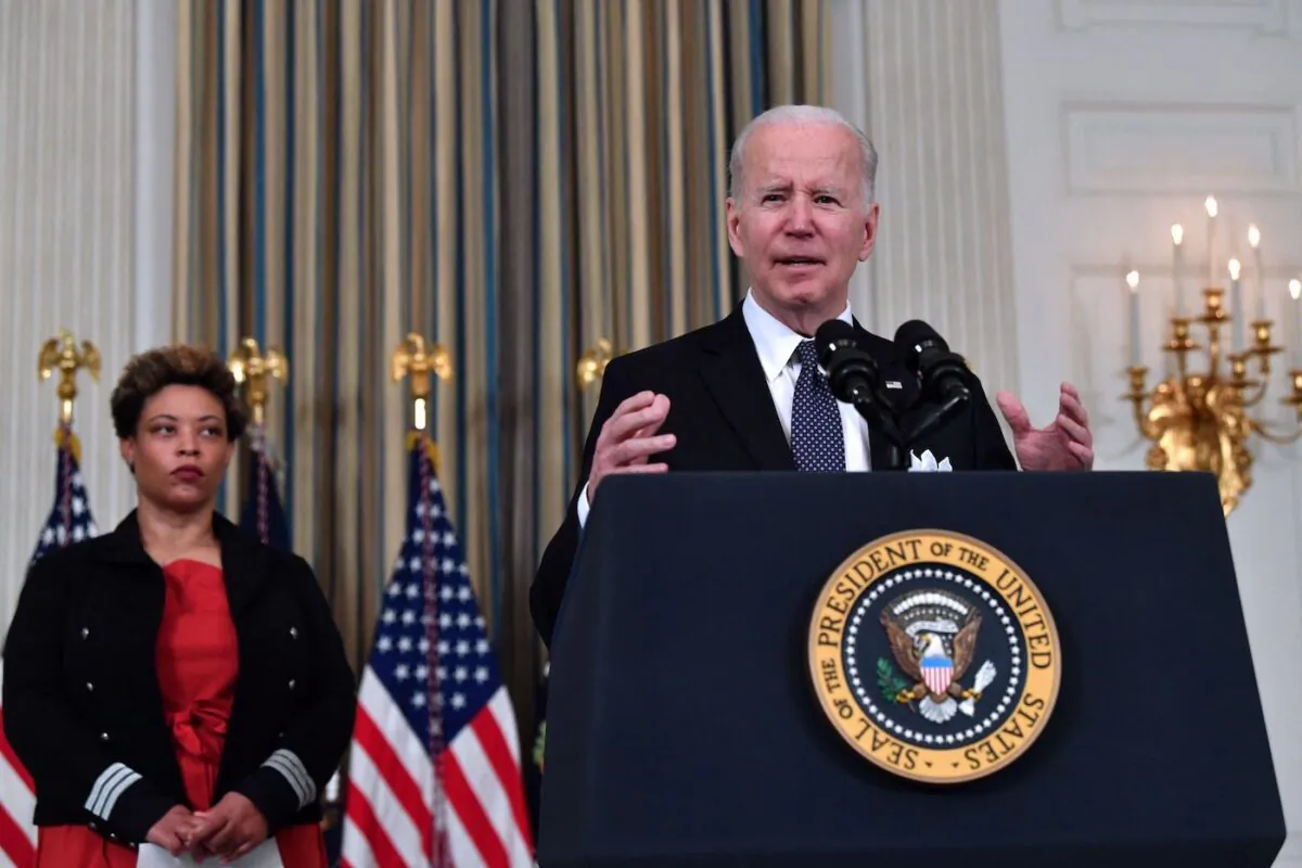U.S. President Joe Biden announces his Budget for Fiscal Year 2023 as Acting Office of Management and Budget Director Shalanda Young listens in the State Dining Room of the White House in Washington on March 28, 2022. (Nicholas Kamm/AFP via Getty Images)