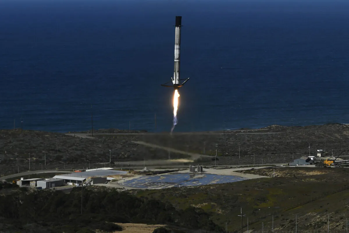 The reusable first stage of a SpaceX (Space Exploration Technologies Corp.) Falcon 9 rocket returns to land after the launch of the NROL-87 spy satellite payload for the National Reconnaissance Office from the SLC-4E launch pad at Vandenberg U.S. Space Force Base in Lompoc, Calif., on Feb. 2, 2022. (Patrick T. Fallon/AFP via Getty Images)