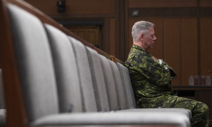 Chief of Defence Staff Jonathan Vance sits in the front row during a news conference, June 26, 2020 in Ottawa. (The Canadian Press/Adrian Wyld)