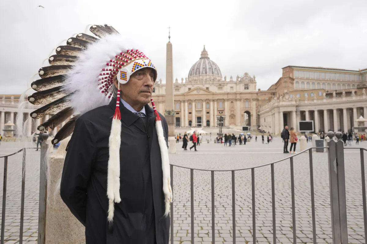 Former national chief of the Assembly of First Nations, Phil Fontaine, stands outside St. Peter's Square at the end of a meeting with Pope Francis at the Vatican, on March 31, 2022. (Andrew Medichini/AP Photo)