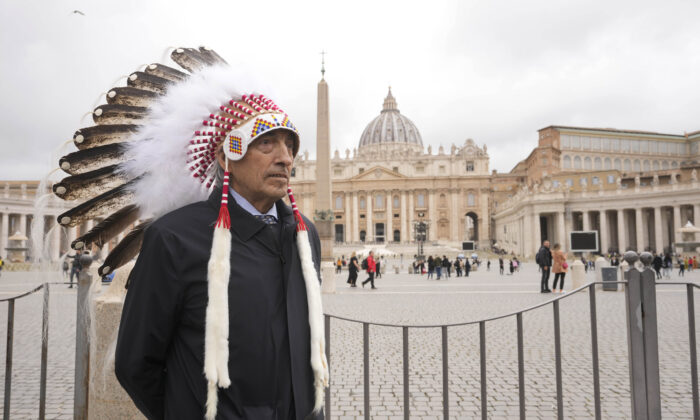 Former national chief of the Assembly of First Nations, Phil Fontaine, stands outside St. Peter's Square at the end of a meeting with Pope Francis at the Vatican, on March 31, 2022. (Andrew Medichini/AP Photo)