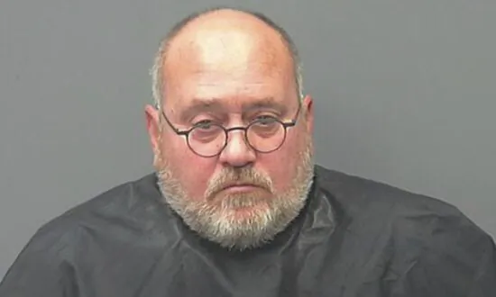 Civilian Army Leader Led Child Porn Ring, Risked US Security