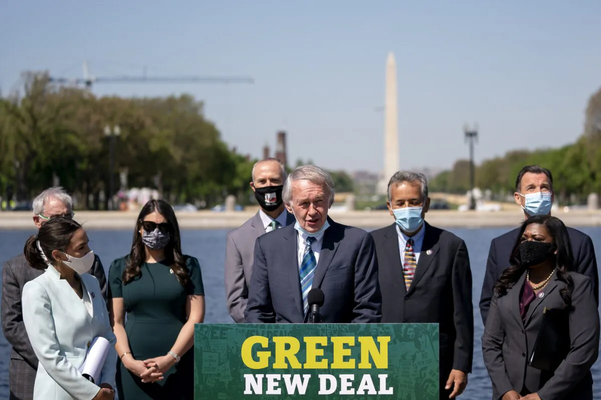 Senator Edward Markey (D-Mass.), center, speaks during a news conference on Capitol Hill in Washington, D.C., on April 20, 2021, as Lawmakers reintroduced the Green New Deal and introduced the Civilian Climate Corps Act. (Stefani Reynolds/Bloomberg via Getty Images)