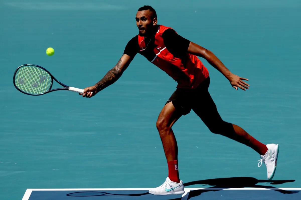 Nick Kyrgios of Australia returns a shot to Jannik Sinner of Italy during the Miami Open at Hard Rock Stadium in Miami Gardens, Fla., on March 29, 2022. (Matthew Stockman/Getty Images)