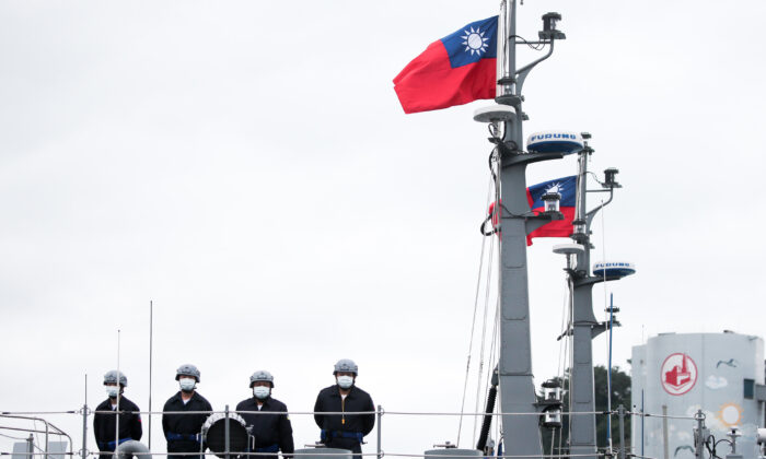 Soldiers stand onboard a Taiwan Navy minelayer in Keelung, Taiwan, on Jan. 7, 2022. Taiwan is bracing for more Chinese military patrols this year, after People's Liberation Army incursions more than doubled in 2021, fueling concern about a clash between the region's big powers. (I-Hwa Cheng/Bloomberg via Getty Images)