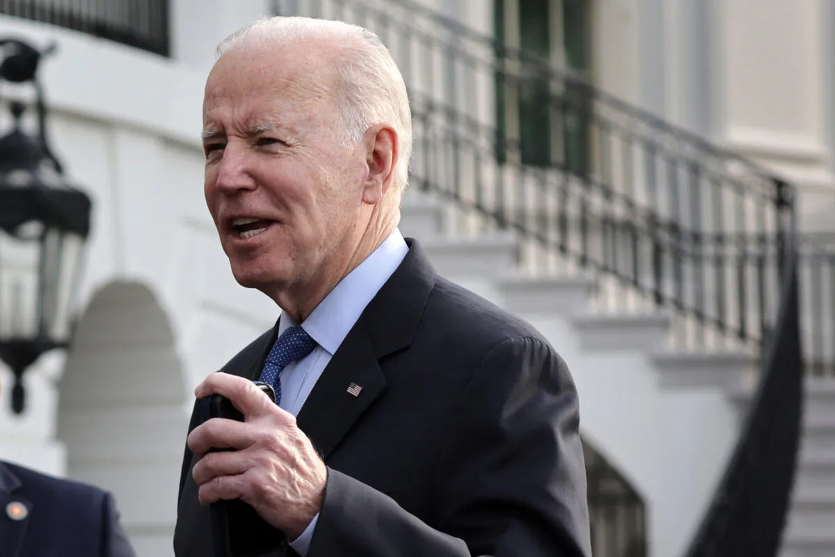 President Joe Biden speaks to members of the press prior to a Marine One departure from the White House in Washington on March 23, 2022. (Alex Wong/Getty Images)