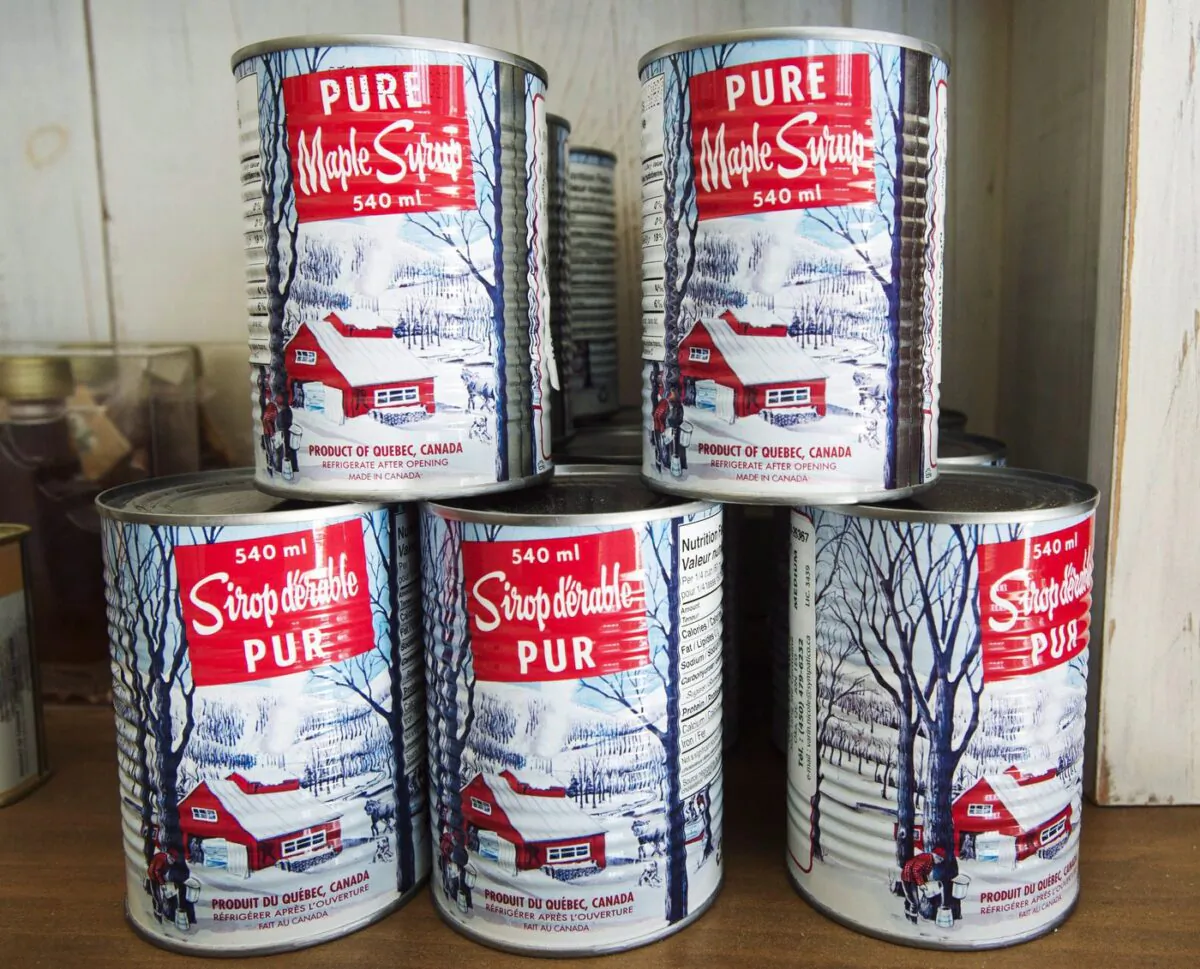 Maple syrup cans are seen at a sugar shack on Feb. 10, 2017 in Oka, Quebec. (The Canadian Press/Ryan Remiorz)