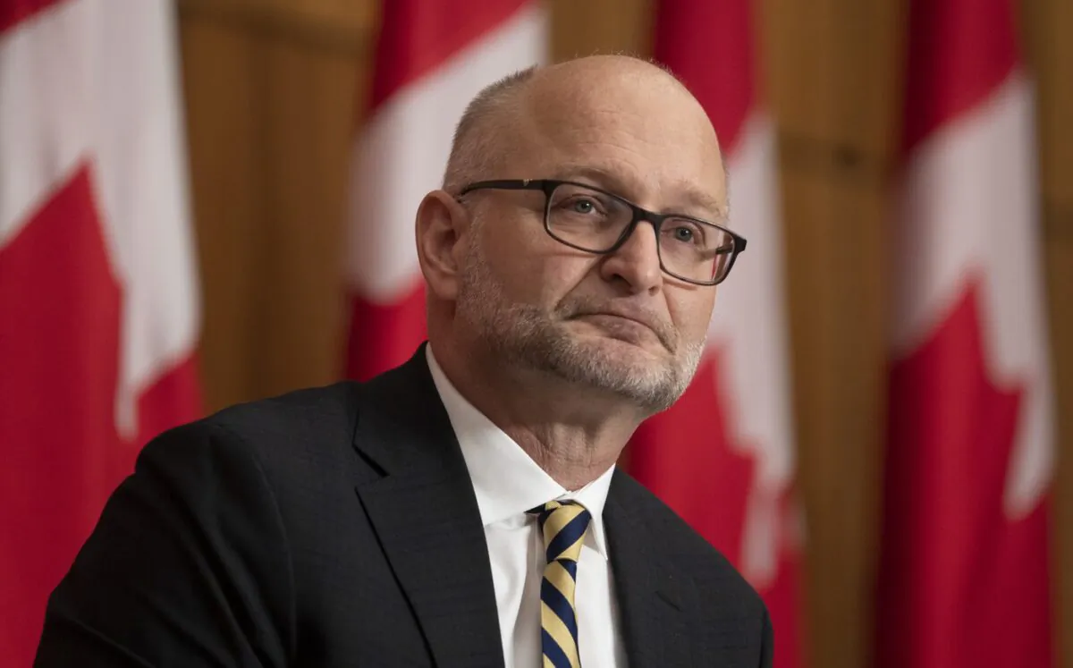 Minister of Justice David Lametti speaks about repealing mandatory minimum sentences during a news conference in Ottawa on Dec. 7, 2021. (Adrian Wyld/The Canadian Press)