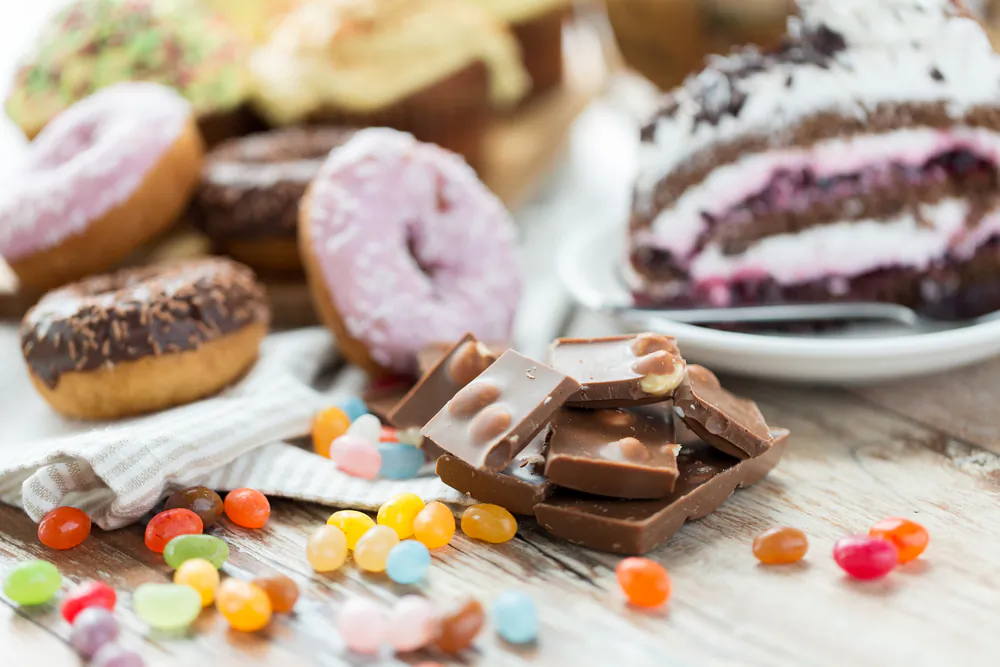 Food like the items on this table will no longer be advertised to children in Canada if a bill that just passed in the House of Commons is subsequently passed in the Senate. (Shutterstock)