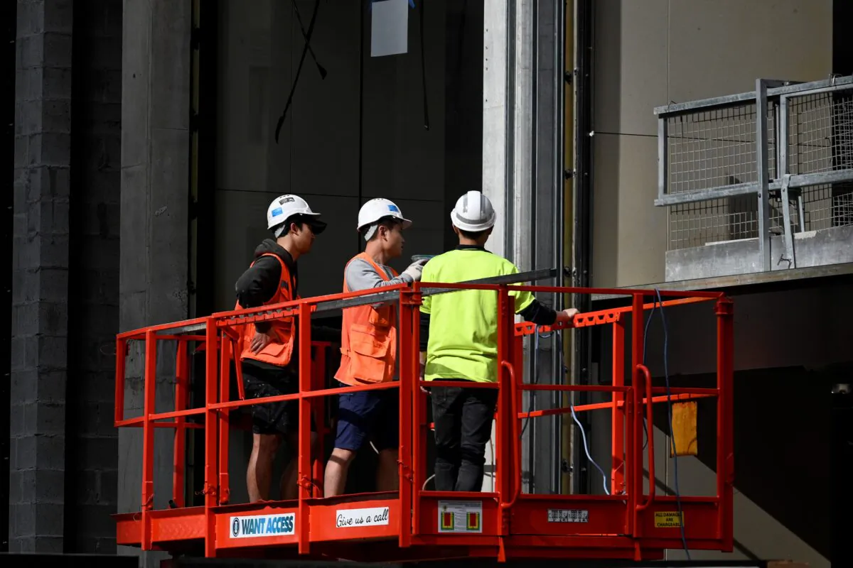 Labourers work at a construction site in the central business district of Sydney in Australia, on June 18, 2020. (Saeed Khan/AFP via Getty Images)