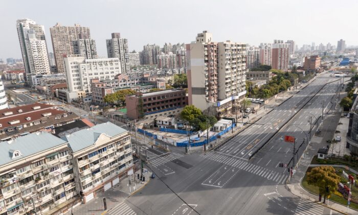 Empty streets are seen during the second stage of a COVID-19 lockdown in the Yangpu district in Shanghai on April 1, 2022. (STR/AFP via Getty Images)