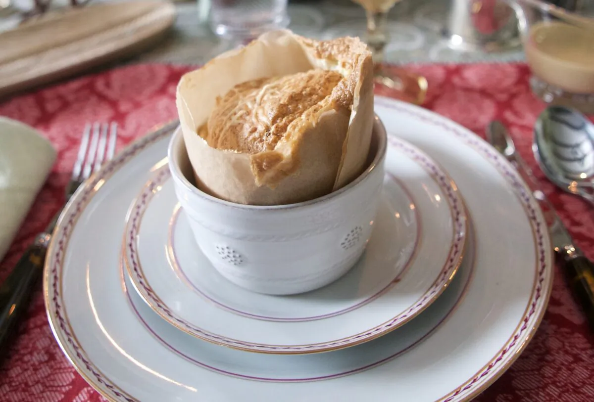 These impressive soufflés are flavored with goat cheese and chives, but you can play with your favorite flavor combinations. (Victoria de la Maza)