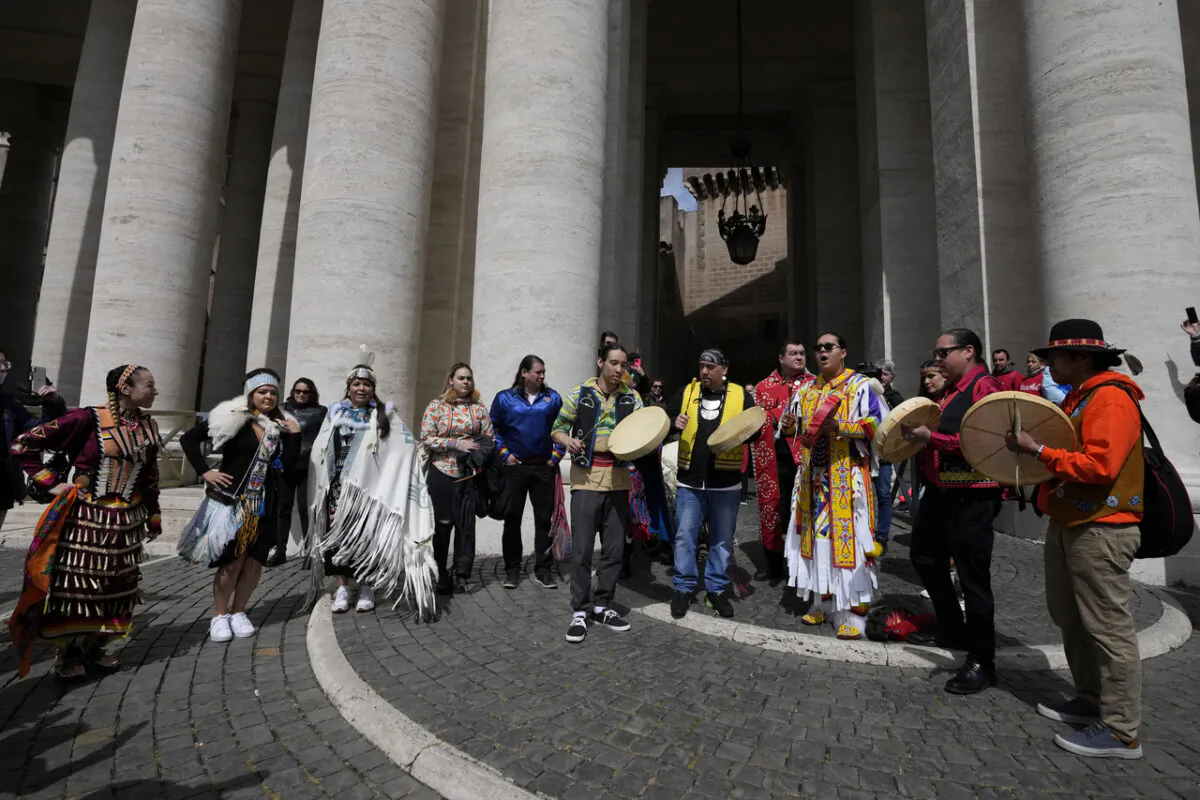 Indigenous artists from across Canada perform in St.Peter's Square, at the Vatican, on April 1, 2022. Pope Francis on that day made a historic apology to Indigenous Peoples for the Catholic-run Indian residential schools in Canada. The pontiff said he hoped to visit Canada in late July to deliver the apology in person. (AP Photo/Alessandra Tarantino)
