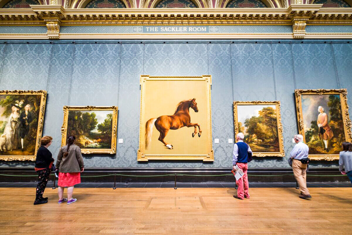 Visitors admire the Arabian thoroughbred “Whistlejacket” in George Stubbs’s near-life-size painting of the same name, at The National Gallery, London, in 2017. (Chakrit Yenti/Shutterstock)