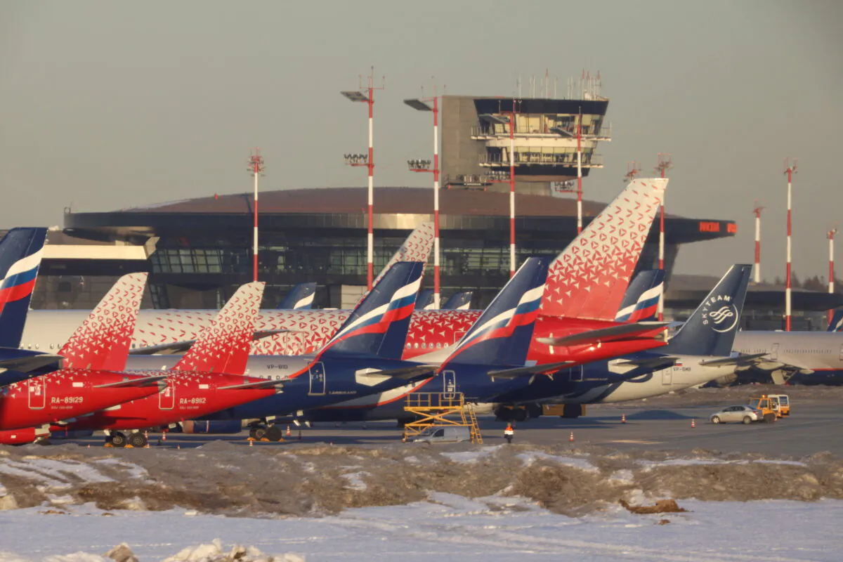 Passenger planes owned by Russia's airlines, including Aeroflot and Rossiya, are parked at Sheremetyevo International Airport in Moscow, Russia, on March 1, 2022. (Marina Lystseva/Reuters)