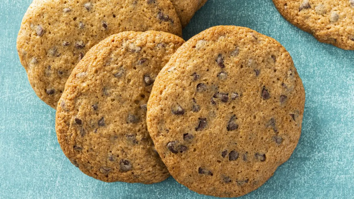 Pressing these cookies before they go into the oven encourages them to spread out evenly for optimal crispiness. (Catrine Kelty)