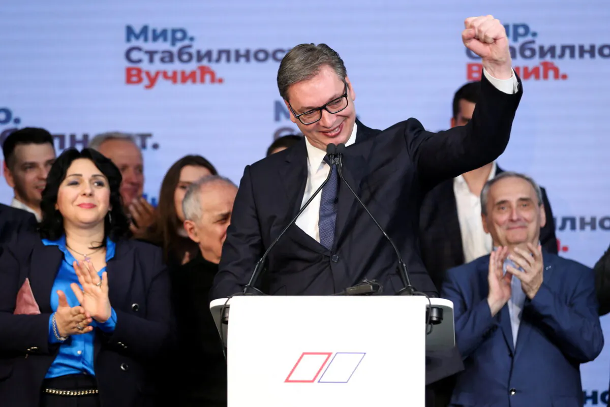 Serbian President and presidential candidate Aleksandar Vucic (C) reacts after the results of the presidential election, in Belgrade, Serbia, on April 3, 2022. (Antonio Bronic/Reuters)