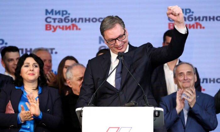 Serbian President and presidential candidate Aleksandar Vucic (C) reacts after the results of the presidential election, in Belgrade, Serbia, on April 3, 2022. (Antonio Bronic/Reuters)