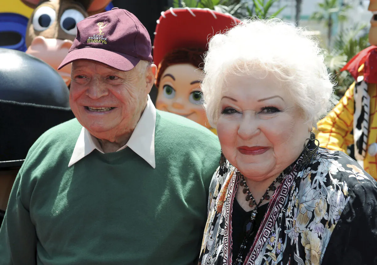 Estelle Harris, at right, and Don Rickles arrive at the world premiere of "Toy Story 3", at The El Capitan Theater in Los Angeles, on June 13, 2010. (Katy Winn/AP Photo, File)