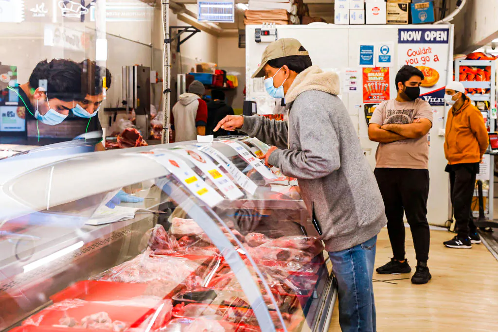 People are seen in a butcher shop in Lakemba in Sydney, Australia, on July 22, 2021. (Jenny Evans/Getty Images)
