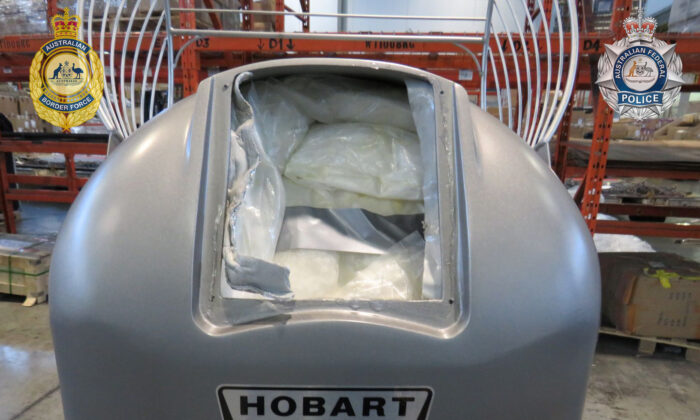 Three men have now been charged after 100kg of meth was found inside a commercial dough mixer in Sydney, Australia on April 3, 2022. (Australian Defence Force)  