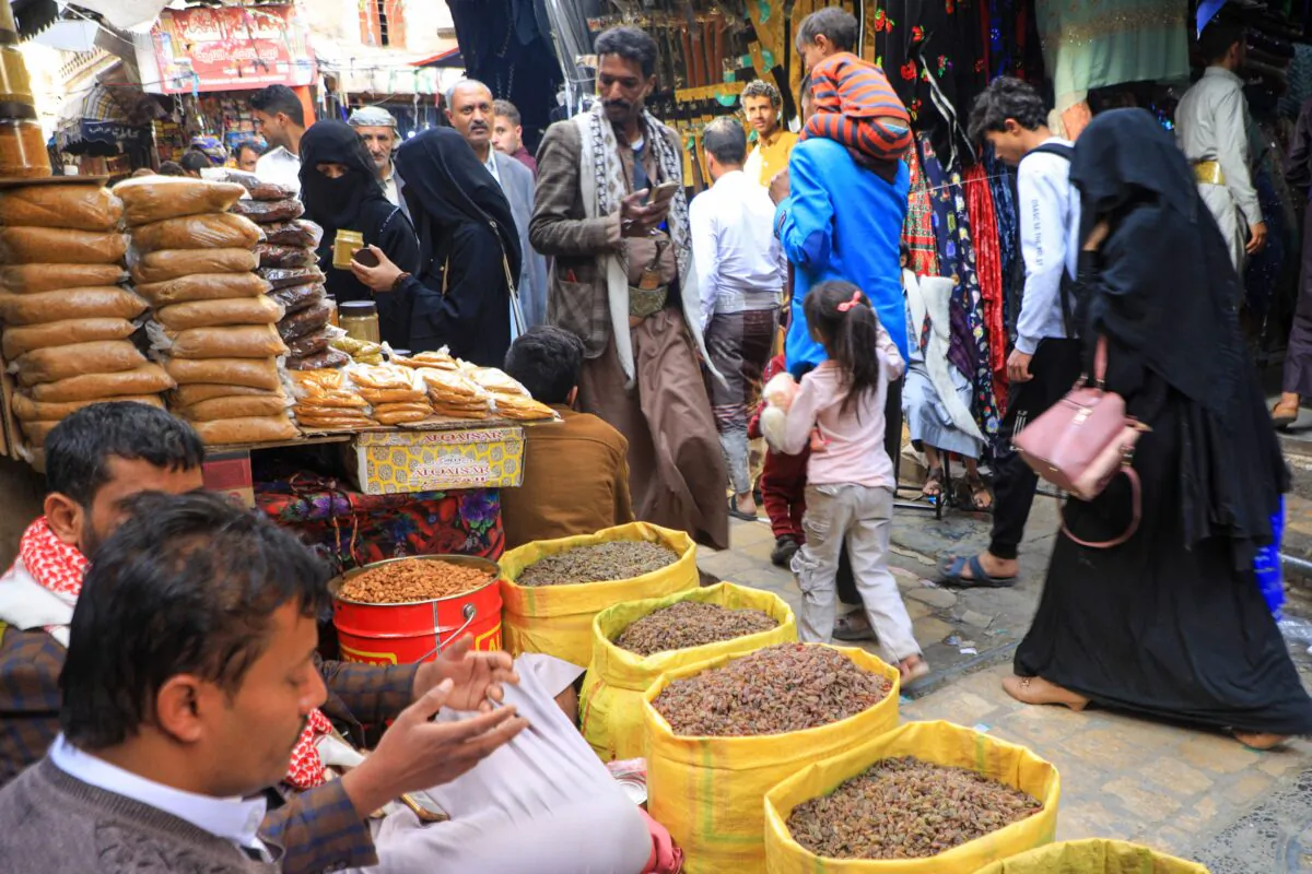 Yemenis shop at a market in the old city of the Yemeni capital Sanaa on April 2, 2022. (Mohammed Huwais/AFP via Getty Images)
