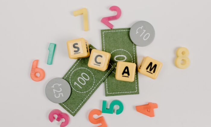 Stock photo of letters forming the word "scam." (Tara Winstead/Pexels)