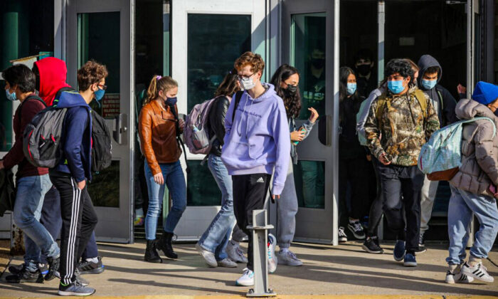 Students leave Washington-Liberty High School in Arlington County, Va., in a file image. (Evelyn Hockstein/Reuters)