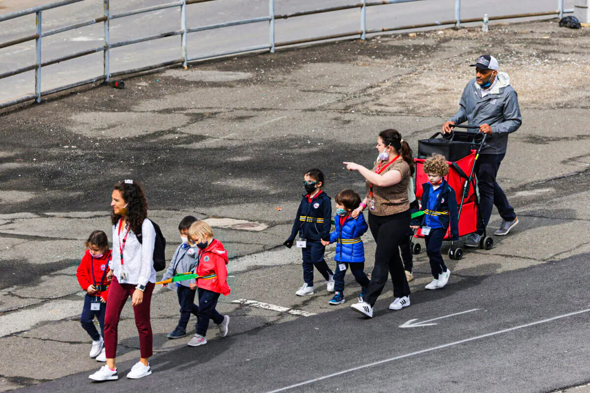 Children on the first day that the indoor mask mandate was lifted for public schools in New York City, on March 7, 2022. (REUTERS/Andrew Kelly)