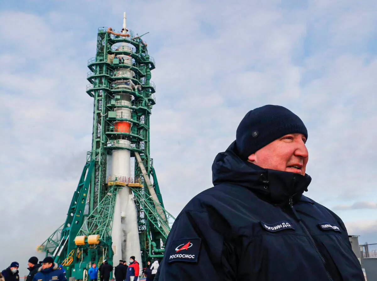 Director General of Roscosmos Dmitry Rogozin stands in front of the Soyuz MS-20 spacecraft at the Baikonur Cosmodrome, Kazakhstan, on Dec. 8, 2021. (Shamil Zhumatov/Pool/Reuters)