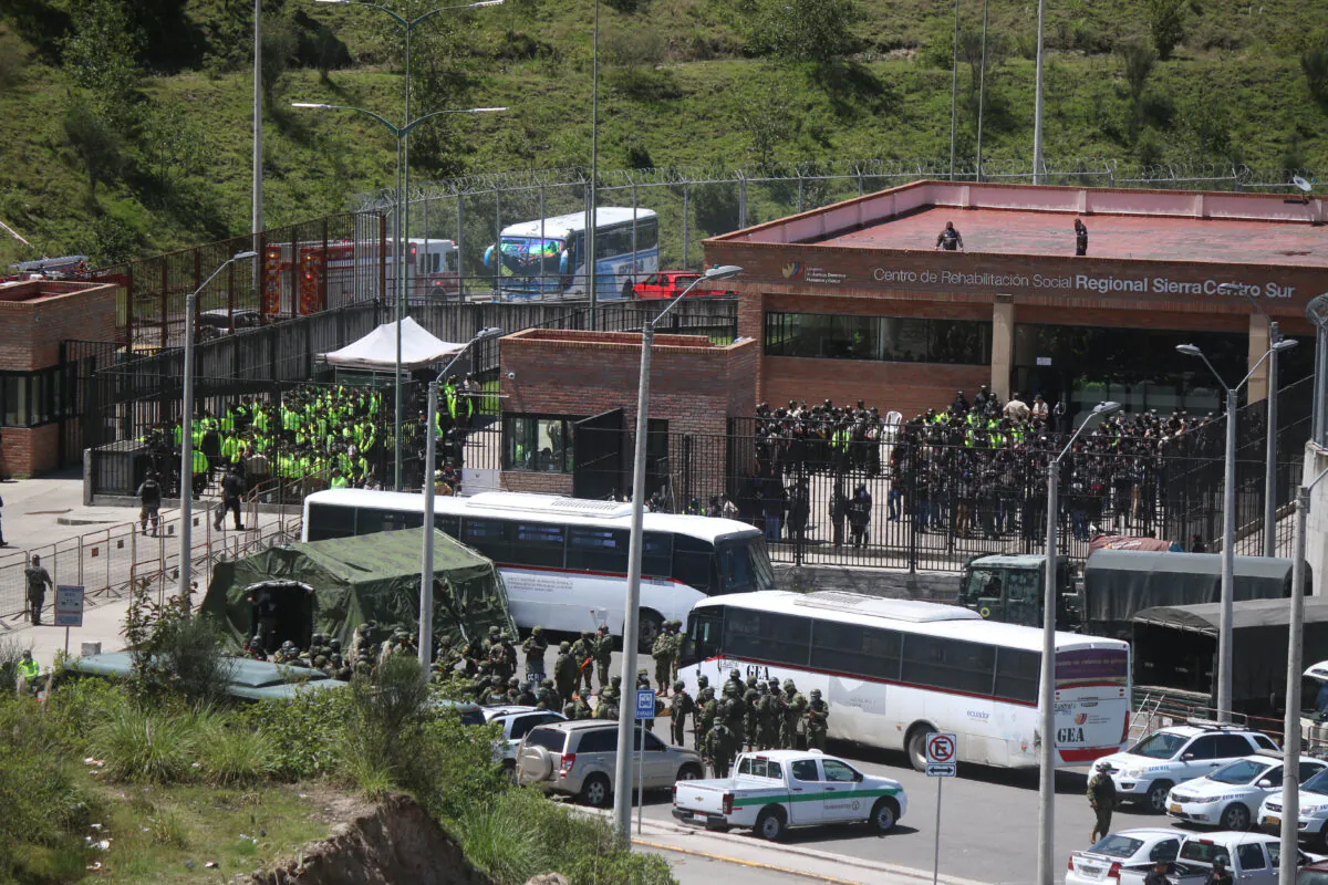 Police and military guard the CRS Turi prison a day after a riot in Cuenca, Ecuador, on April 4, 2022. (Fernando Machado/AFP via Getty Images)