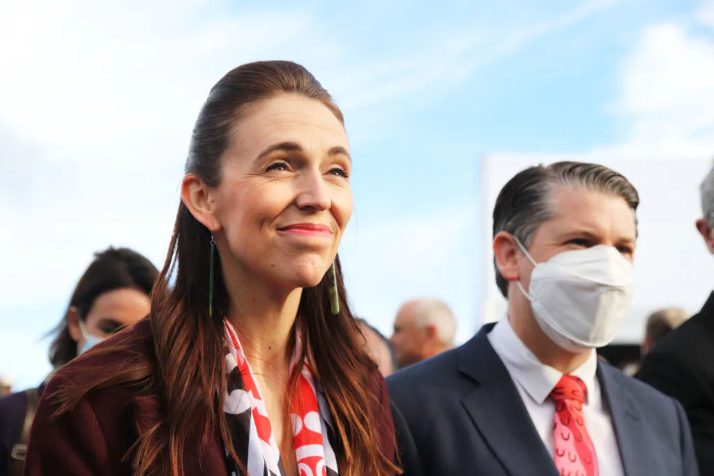 New Zealand Prime Minister Jacinda Ardern smiles after cutting the ribbon to open Transmission Gully SH1 motorway in Wellington, New Zealand, on March 30, 2022. (Lynn Grieveson/Getty Images)