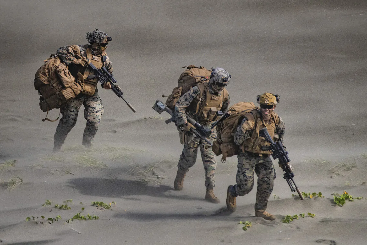 U.S. marines take part in a joint amphibious assault exercise as part of the annual 'Balikatan' (shoulder-to-shoulder) U.S.-Philippines war exercises off the waters of South China Sea 2022 in Claveria, Cagayan province, Philippines, on March 31, 2022. (Ezra Acayan/Getty Images)