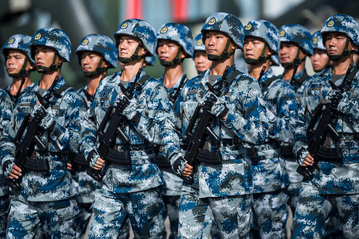 People's Liberation Army soldiers at the Shek Kong barracks—part of the Hong Kong garrison—on June 30, 2017. (Dale De La Rey/AFP via Getty Images)