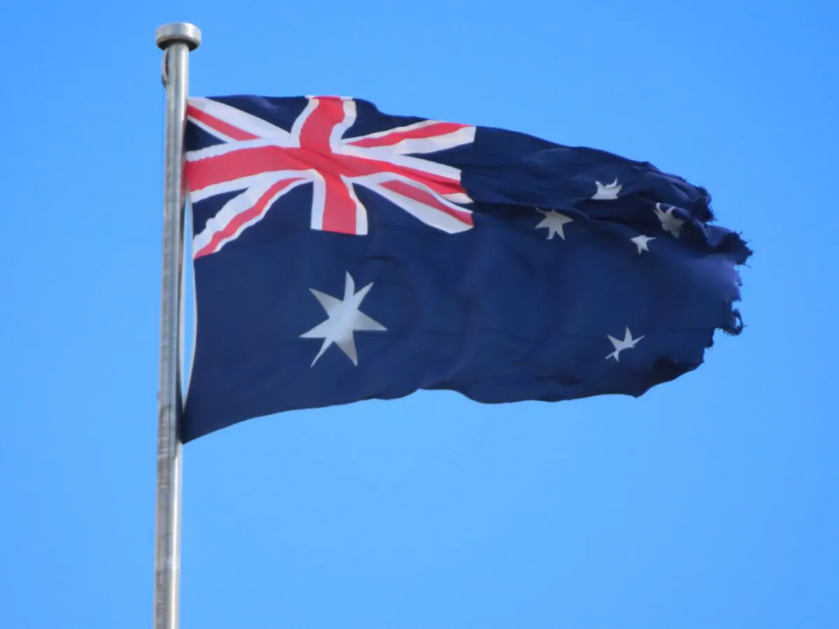 The Australian flag is seen on the Parliament House in Canberra, Australia, on April 1, 2022. (Rebecca Zhu/The Epoch Times)