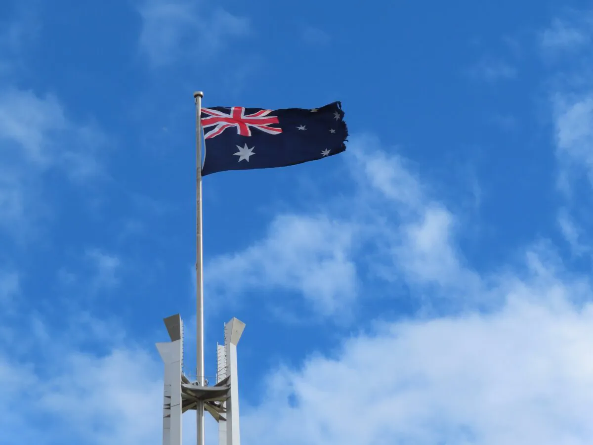 The Australian flag is seen on the Parliament House in Canberra, Australia, on April 1, 2022. (Rebecca Zhu/The Epoch Times)