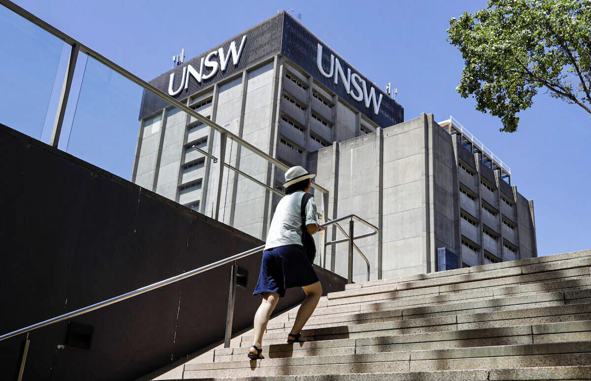 A student walks around the University of New South Wales campus in Sydney, Australia, on Dec. 1, 2020. (AP Photo/Mark Baker)
