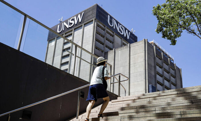 A student walks around the University of New South Wales campus in Sydney, Australia, on Dec. 1, 2020. (AP Photo/Mark Baker)
